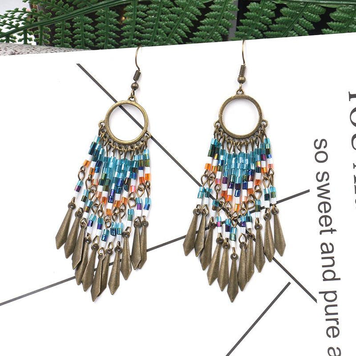 Women's Bohemian Round Hollow Bead Tassel Earrings