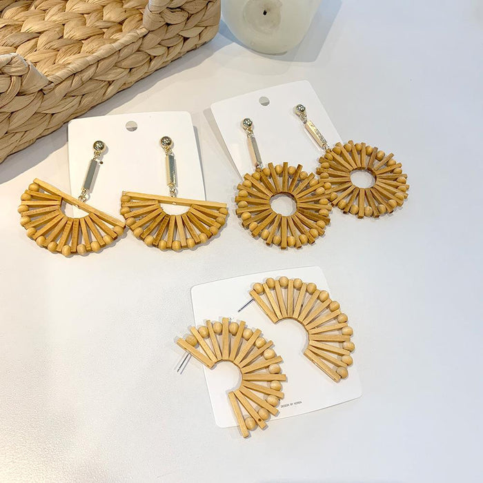 Exaggerated Fan-shaped Hollowed Round Wooden Earrings Female