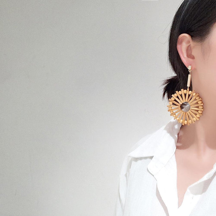 Exaggerated Fan-shaped Hollowed Round Wooden Earrings Female