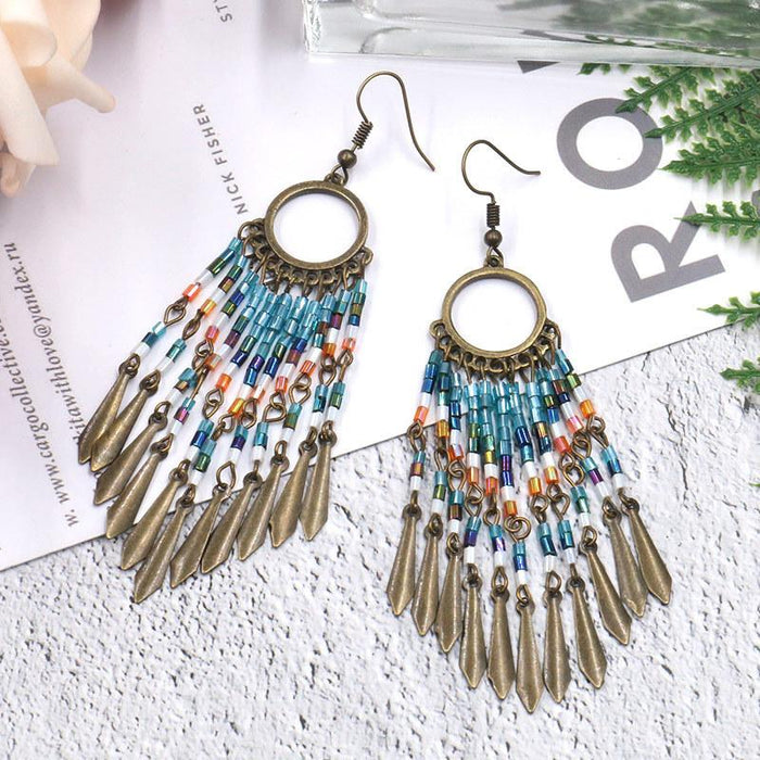 Women's Bohemian Round Hollow Bead Tassel Earrings