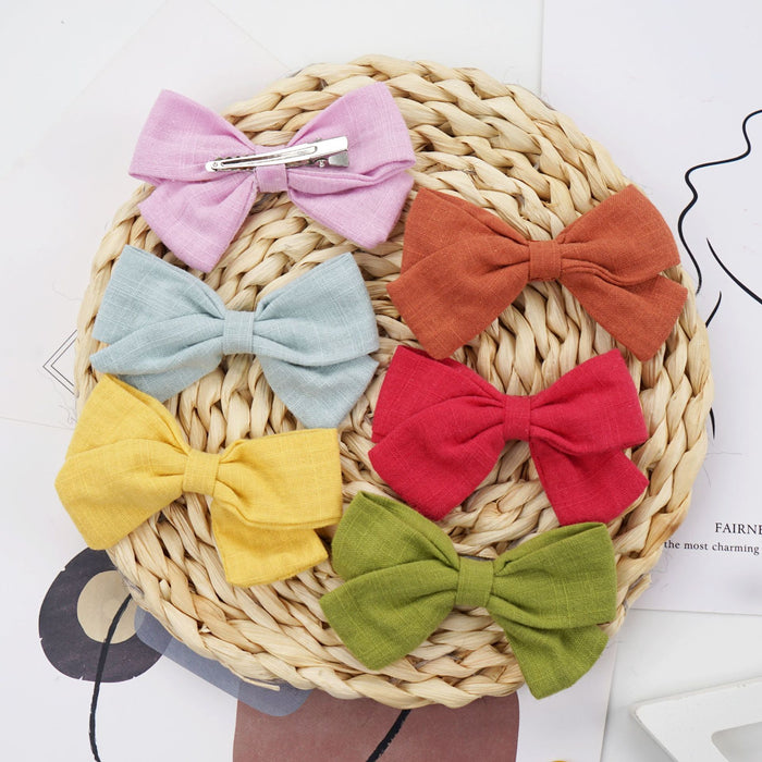 Slub cotton and linen bow hairpin
