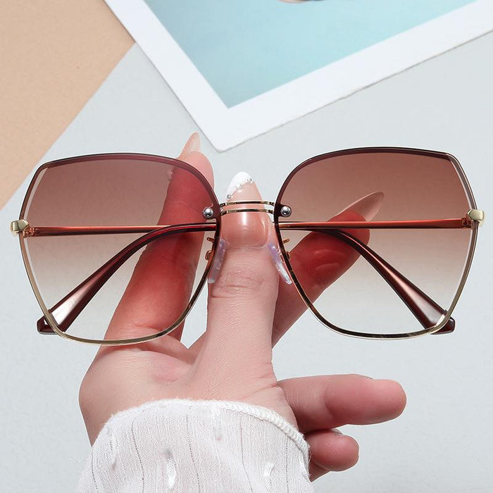 UV resistant diamond rimmed Sunglasses