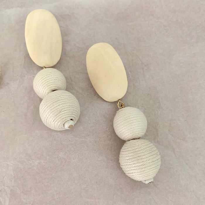 Exaggerated Long White Ball Wooden Grass Rattan Woven Earrings