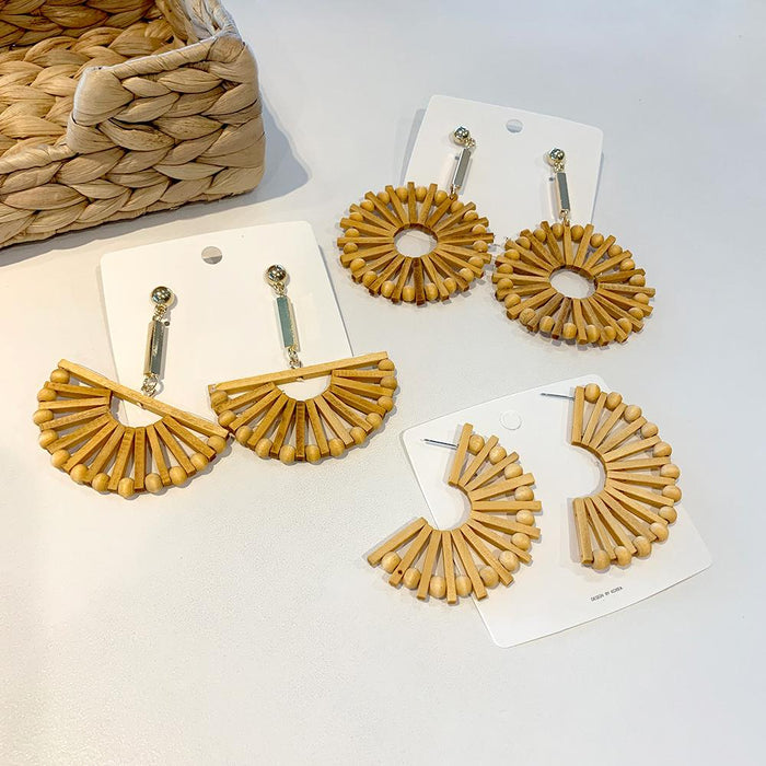 Exaggerated Fan-shaped Hollowed Round Wooden Earrings Female