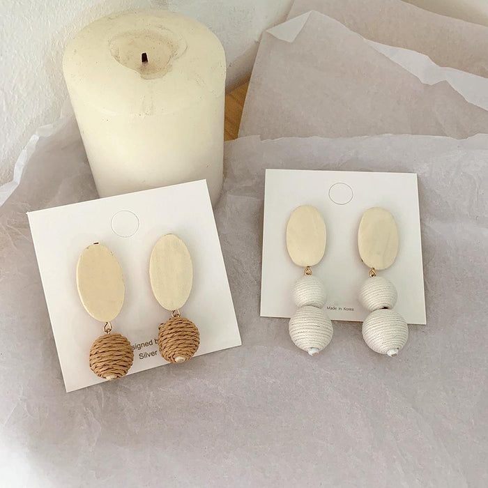 Exaggerated Long White Ball Wooden Grass Rattan Woven Earrings